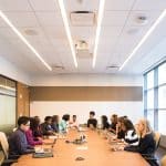 people sitting on conference room